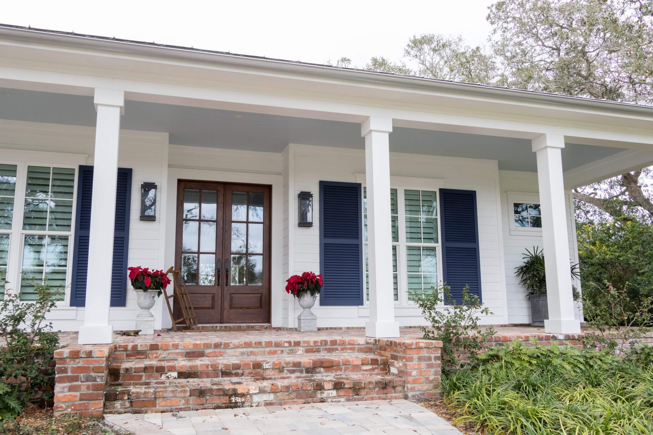 Front yard and entrance of a bungalow home