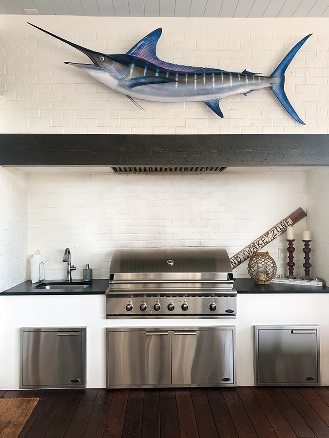 https://denneencustomhomes.com/wp-content/uploads/2020/09/Houser-res.-outdoor-kitchen-with-fish-edited.jpg